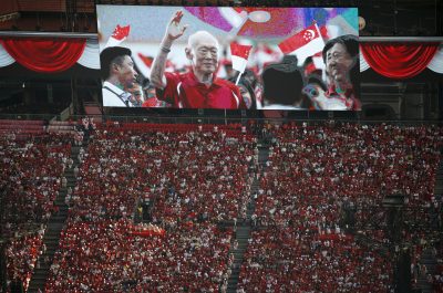 A video tribute of former prime minister Lee Kuan Yew is played during a Golden Jubilee celebration parade rehearsal in Singapore, 1 August 2015 (Photo: Reuters/Edgar Su).