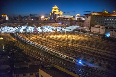 A CRH (China Railway High-speed) bullet train leaves the Beijing West railway station at night in Beijing, China, 8 July 2019 (Photo: Reuters/Liu Jiaye).