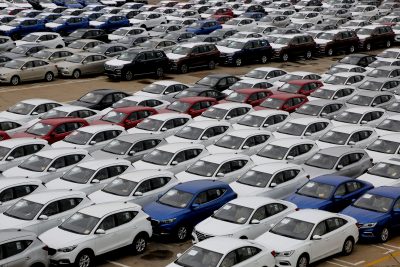Cars waiting to be exported aboard are lined up at a port in Lianyungang city, east China