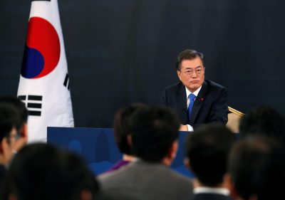 South Korean President Moon Jae-in answers reporters