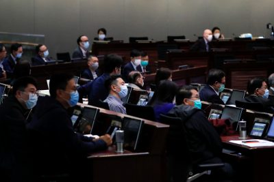 Legislators wear masks to avoid the spread of the coronavirus disease (COVID-19) during the Legislative Council