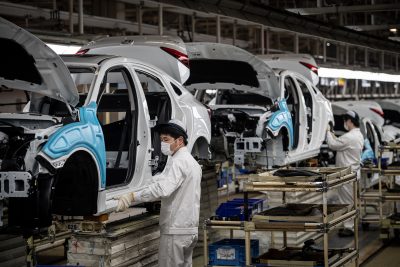 Staff of a local factory owned by Honda Motor Company, a Japanese public multinational conglomerate corporation primarily known as a manufacturer of automobiles, work to produce cars after a long Spring Festival vacation, Wuhan city, central China's Hubei province, 23 March 2020. (Photo: fachaoshi via Reuters).