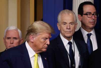 US President Donald Trump walks past Vice President Mike Pence, White House trade adviser Peter Navarro, and Treasury Secretary Stephen Mnuchin at the White House in Washington DC, 9 March 2020 (Photo: Reuters/Jonathan Ernst).