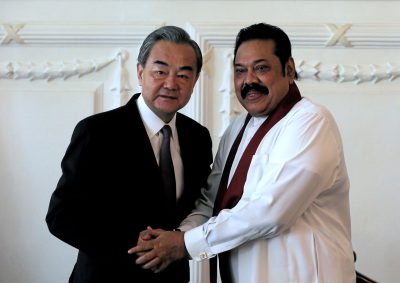 Chinese Foreign Minister Wang Yi shakes hands with Sri Lankan Prime Minister Mahinda Rajapaksa in Colombo, Sri Lanka, 14 January 2020 (Photo: Reuters/Dinuka Liyanawatte).