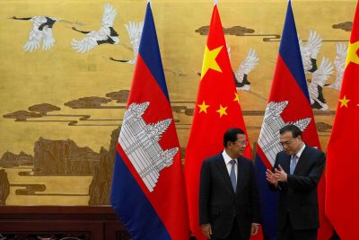 Cambodian Prime Minister Hun Sen chats with Chinese Premier Li Keqiang during a signing ceremony at the Great Hall of the People in Beijing, China, 22 January, 2019 (Photo: Ng Han Guan/Pool via Reuters).