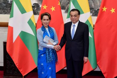 Myanmar's State Counsellor Aung San Suu Kyi shakes hands with Chinese Premier Li Keqiang as they pose for media before their meeting on 25 April 2019 at the Diaoyutai State Guesthouse in Beijing, China (Photo: Reuters/Parker Song).