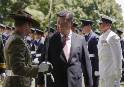 Australian army officer offers directions to China's President Xi as he inspects an honour guard at Government House, Canberra, Australia, 17 November 2014 (Photo: Reuters/David Gray)
