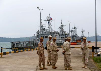 Sailors stand guard near petrol boats at the Cambodian Ream Naval Base, Sihanoukville, Cambodia, 16 July 2019 (Photo:Reuters/Samrang Pring).