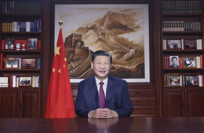 Xi Jinping poses for his annual new year address, 31 December 2021 in Beijing, China (PHOTO: EYEPRESS via Reuters Connect)