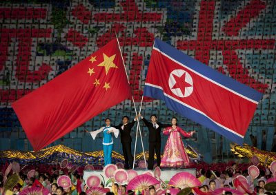 North Korea and China flags during the Arirang mass games in mayday stadium, Pyongang Province, Pyongyang, North Korea, 19 September 2011 (Photo: Reuters/Eric Lafforgue)