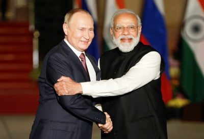 Russia's President Vladimir Putin shakes hands with India's Prime Minister Narendra Modi ahead of their meeting at Hyderabad House in New Delhi on 6 December 2021. (Photo: Adnan Abidi/Reuters)