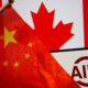 Flags of China and Canada are displayed next to the logo of Asian Infrastructure Investment Bank (AIIB) in this illustration picture taken 15 June 2023 (Photo: Reuters/Florence Lo/Illustration).
