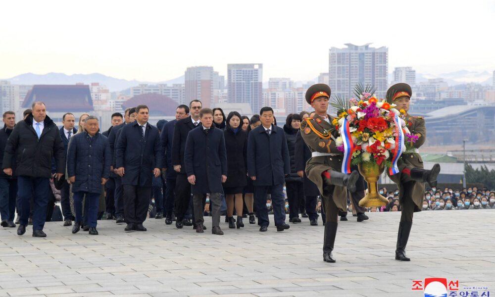 Oleg Kozhemyako, governor of the Russian far eastern region of Primorsky and Ji Kyong Su, North Korea's vice minister of External Economic Relations walk during a march on the day the two countries met for talks on economic cooperation, in Pyongyang, in this picture released by the Korean Central News Agency on 13 December 2023 (Photo: Reuters/Korean Central News Agency).