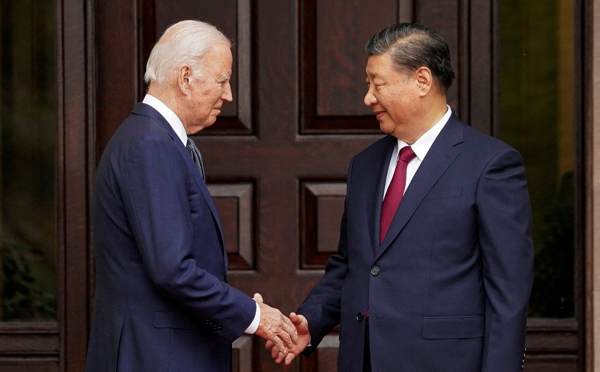 US President Joe Biden shakes hands with Chinese President Xi Jinping at Filoli estate on the sidelines of the Asia-Pacific Economic Cooperation (APEC) summit, in Woodside, California, U.S., 15 November 2023. (Photo: REUTERS/Kevin Lamarque)