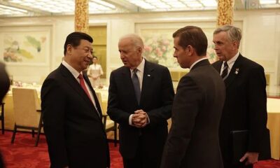 Previously unseen photos of Joe and Hunter Biden meeting with both Chinese President Xi Jinping and many of Hunter's business partners has put new heat on the troubled First Son